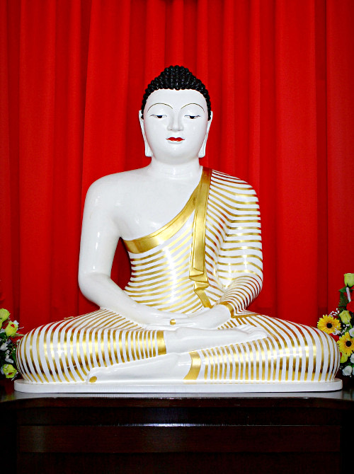 The Buddha image in the Sima House